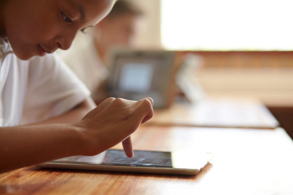 Woman choosing the right app to learn English