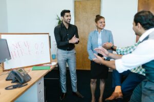 Managers holding a meeting and Boosting team morale