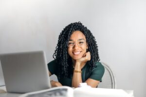 happy female worker feeling included in work due to lack of language barriers